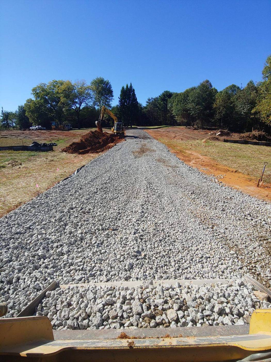 Fresh gravel road base laid and compacted